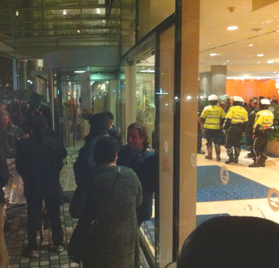 Photo of police inside the hotel during the protest against the National Conference on Ending Homelesness