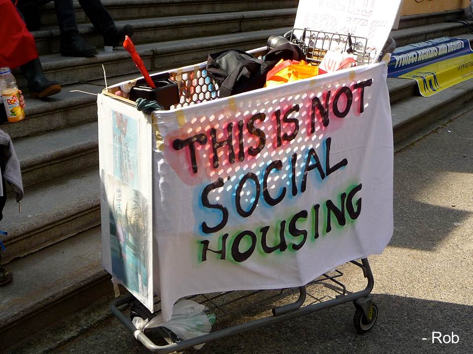 Cart with a banner: This is not Social Housing