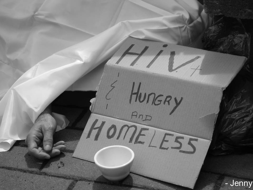 HIV+, Hungry and Homeless, man sleeping with this note