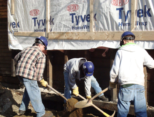 Train for Trades youths at a worksite.